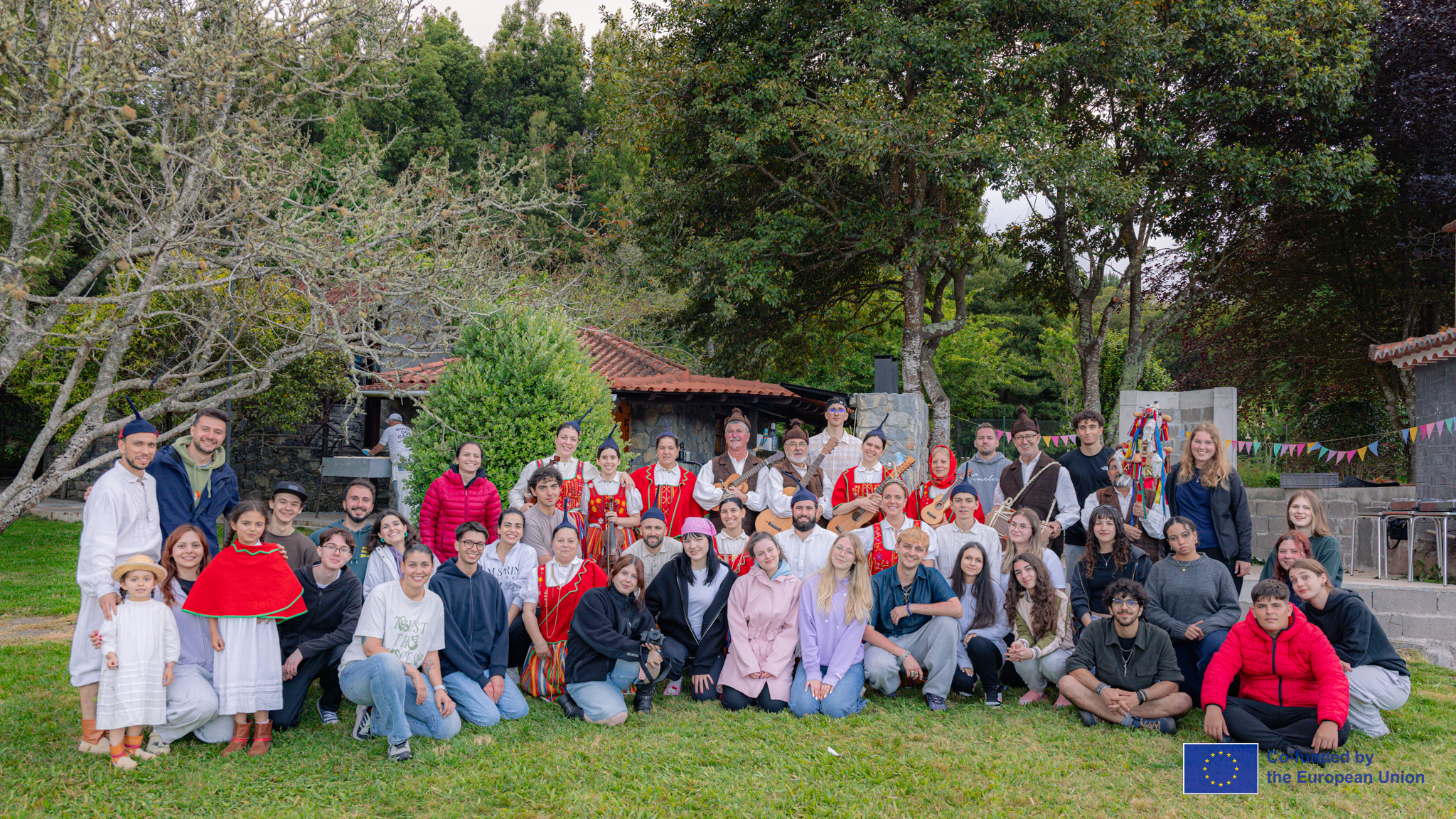 Youth participants gathered beside the sea in Madeira